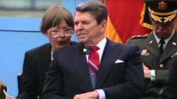 screenshot of video showing President Reagan preparing to give a speech