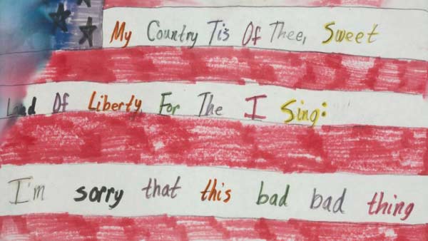 child's color drawing of the American flag with colorful text
