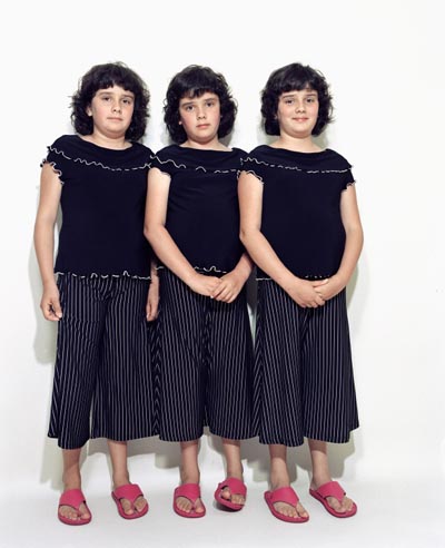 photo of young female triplets