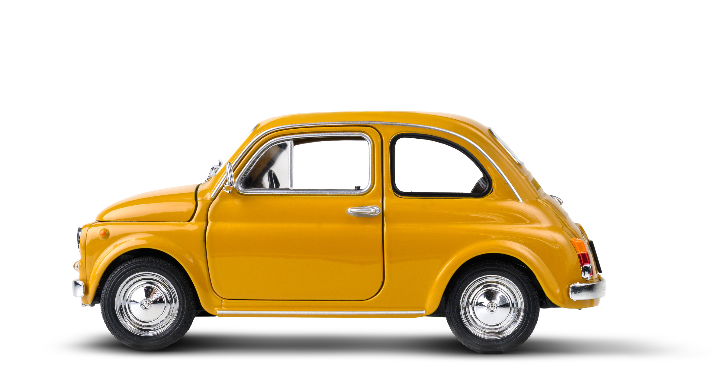 A vintage yellow toy car is pictured.