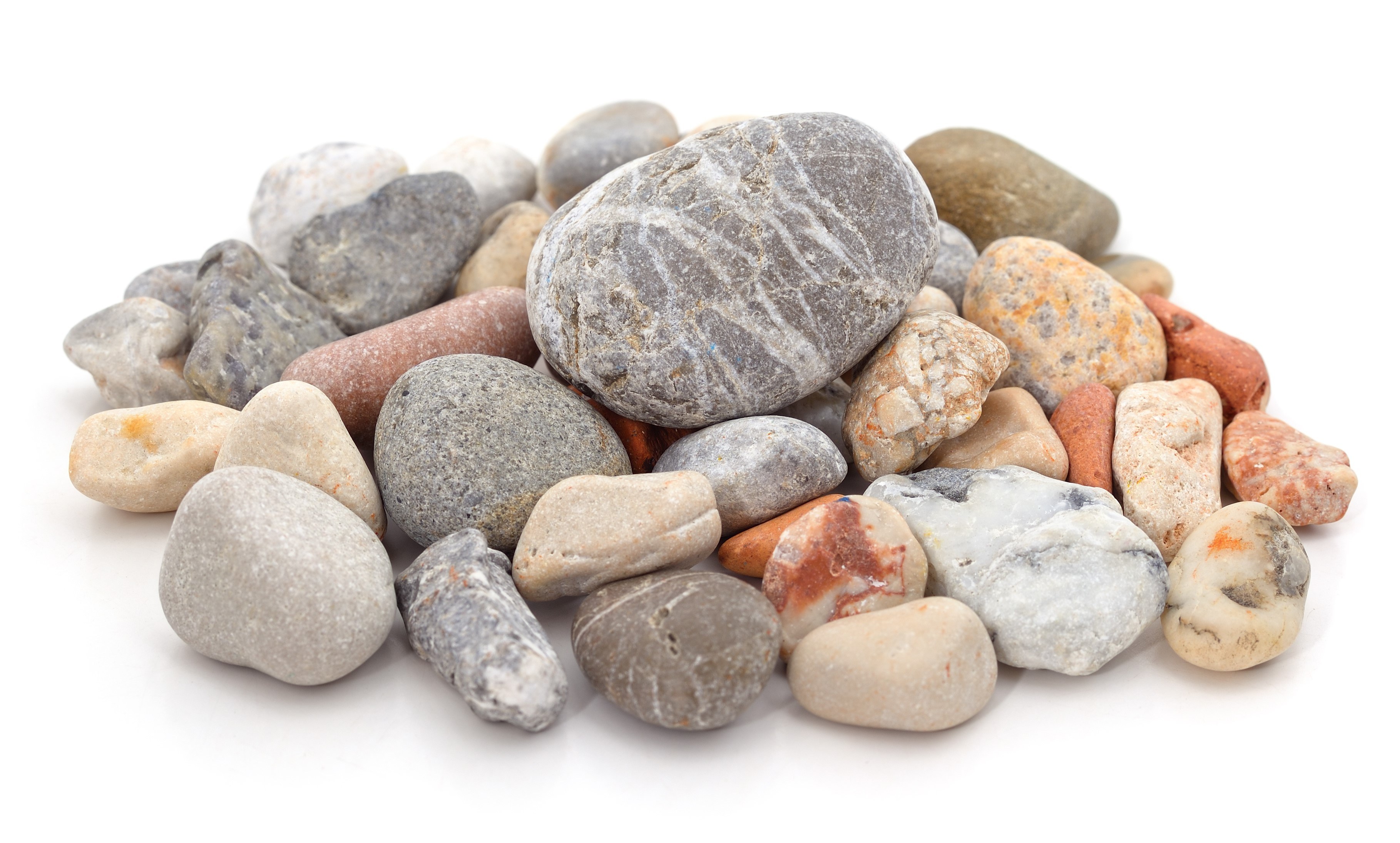 A pile of rocks consists of different colors and sizes.