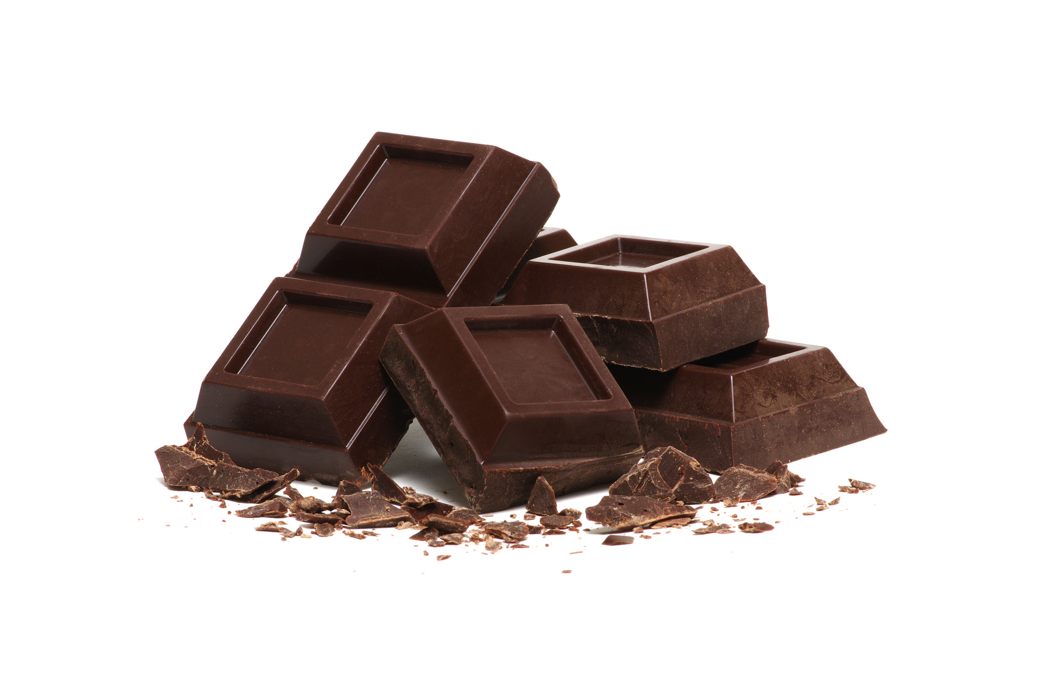 A chocolate bar is broken into individual pieces.